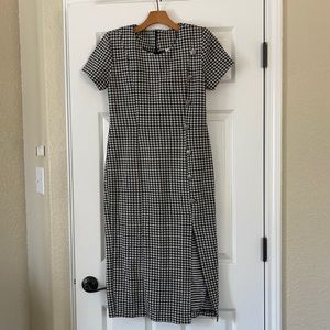 Mid length fitted plaid dress